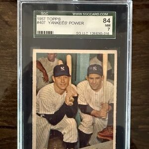 1957 topps Mickey Mantle -Berra. Graded 7